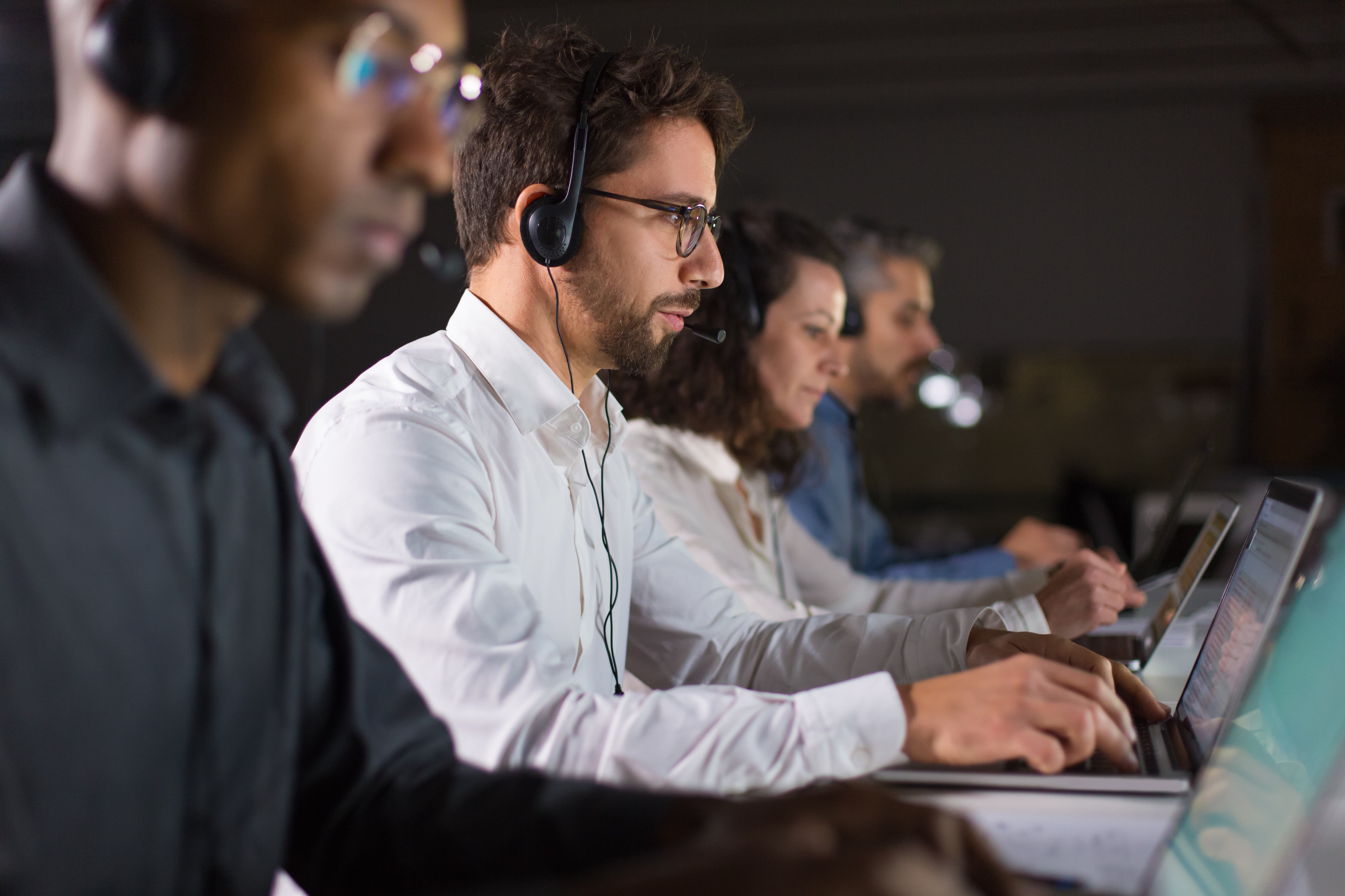 Customer Service Representative taking calls for electrical emergencies in Liverpool